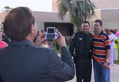 Jim tries the camera-phone, with Darren (brother)